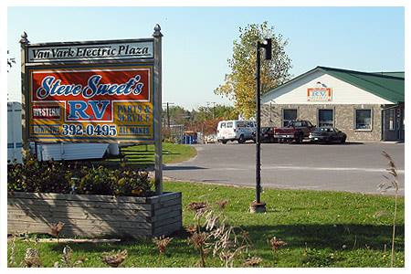 Steve Sweet’s RV roadside sign and shop entrance on Highway 2